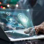 Data scientists. Male programmer using laptop analyzing and developing in various information on futuristic virtual interface screen. Algorithm. marketing and deep learning of artificial intelligence